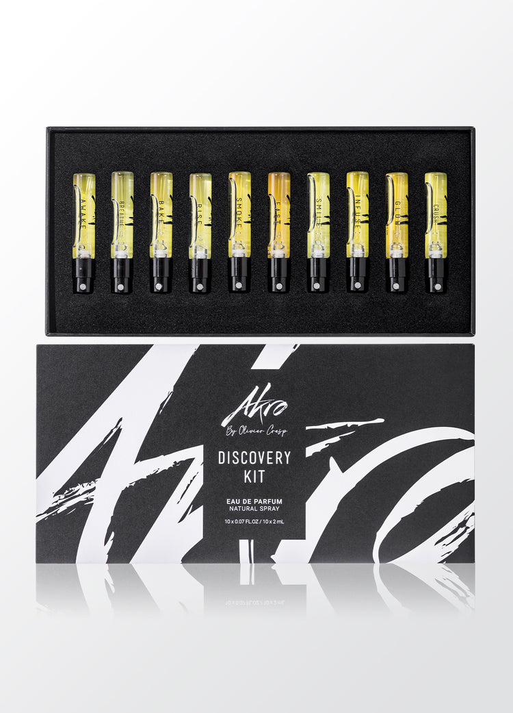 Open AKRO Discovery Kit with ten labelled sample sprays and its black-and-white presentation box.